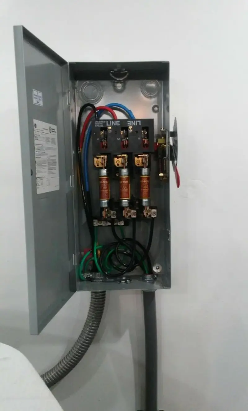 Three-phase disconnect switch installed for Smoke Detector Installation in Woodlawn